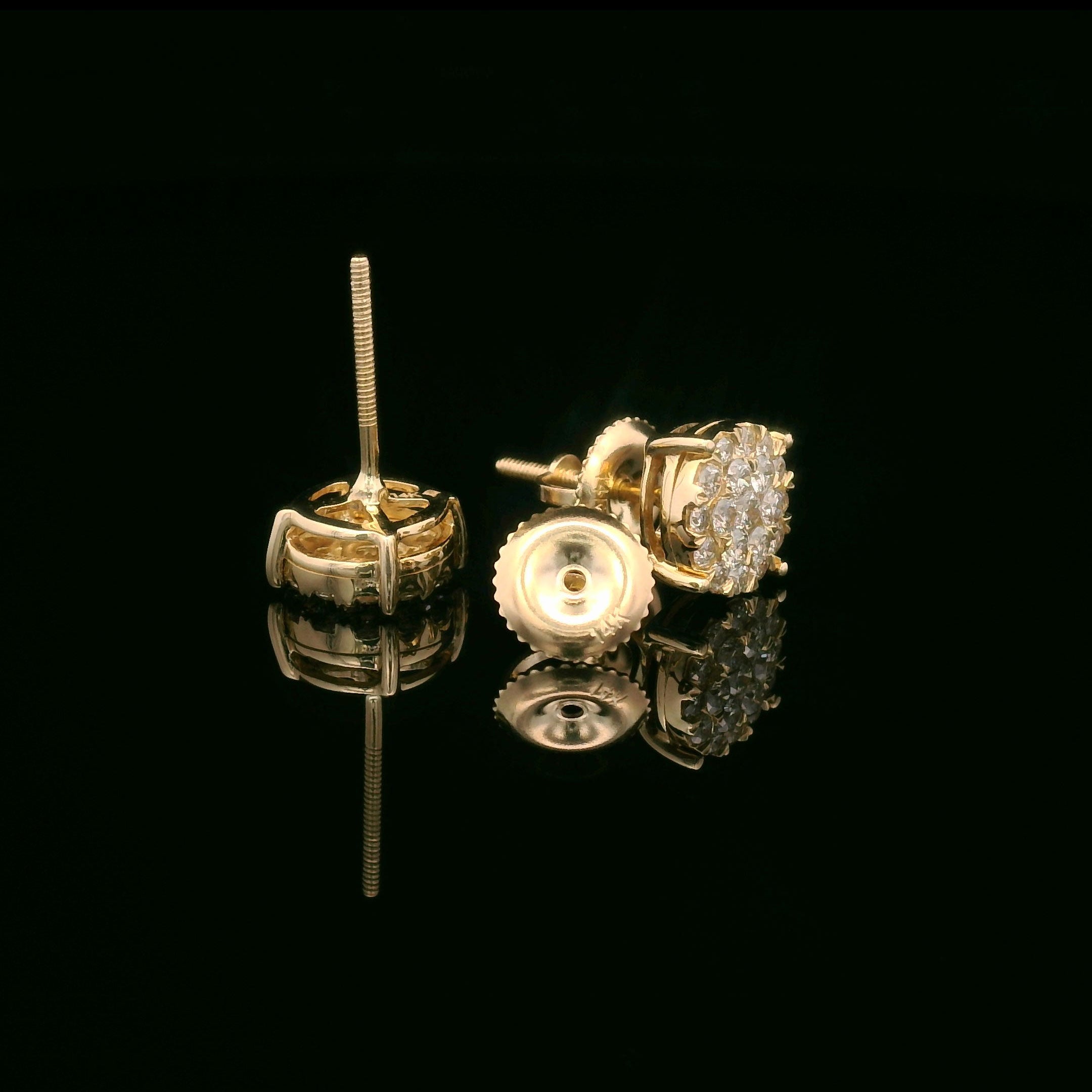 Round diamond earrings set in 14k yellow gold opened
